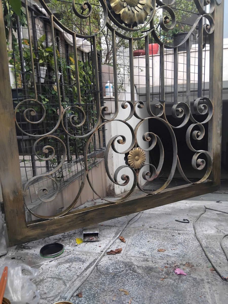 sửa cửa sắt