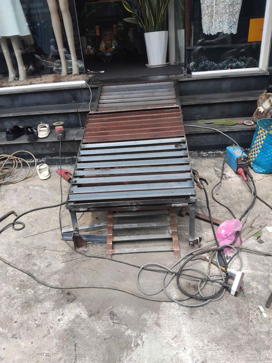 sửa dốc xe lên xuống