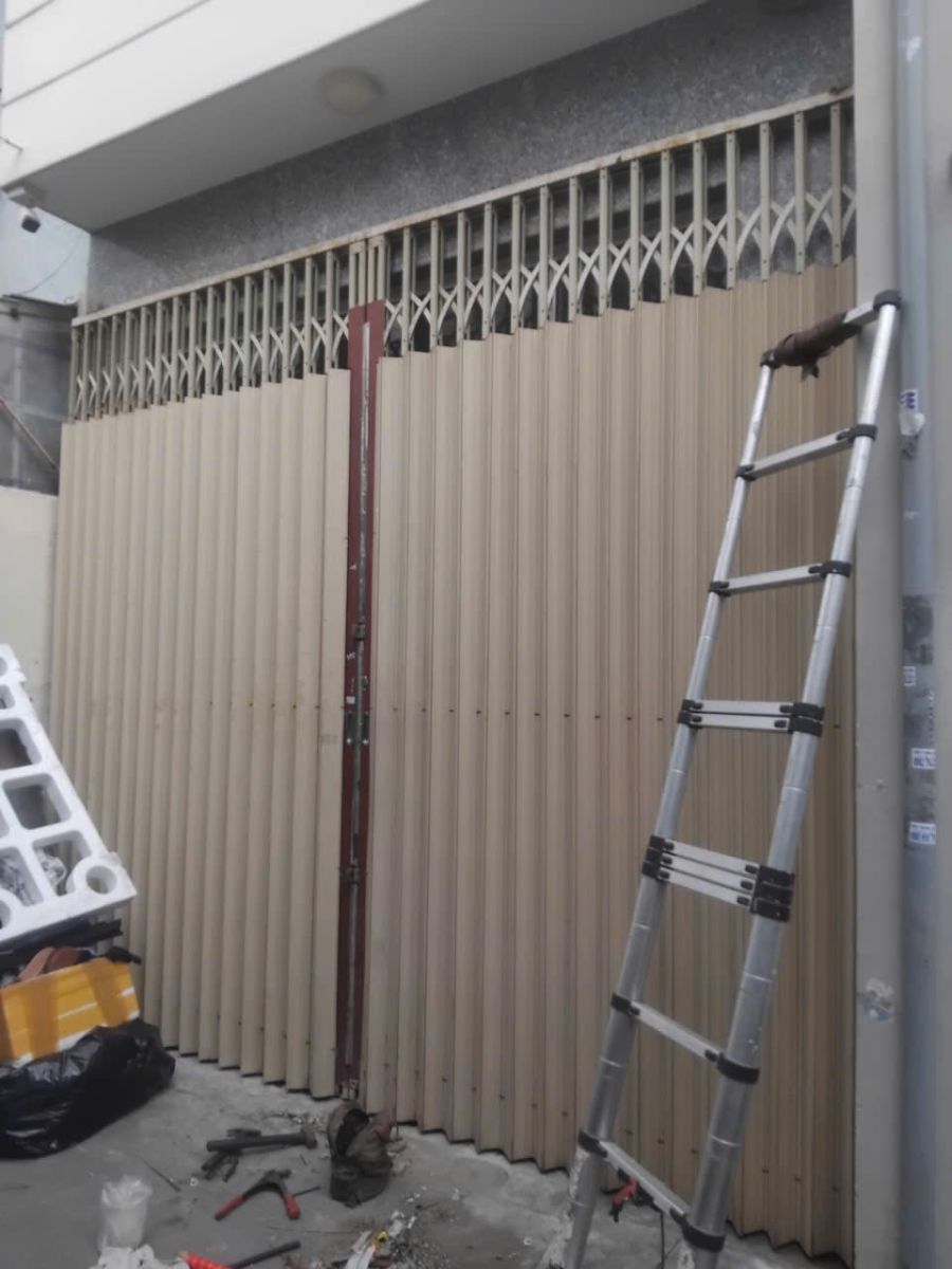sửa cửa sắt kéo