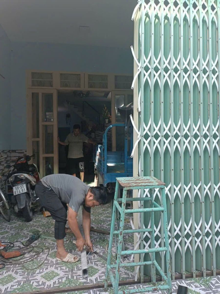 sửa cửa sắt kéo