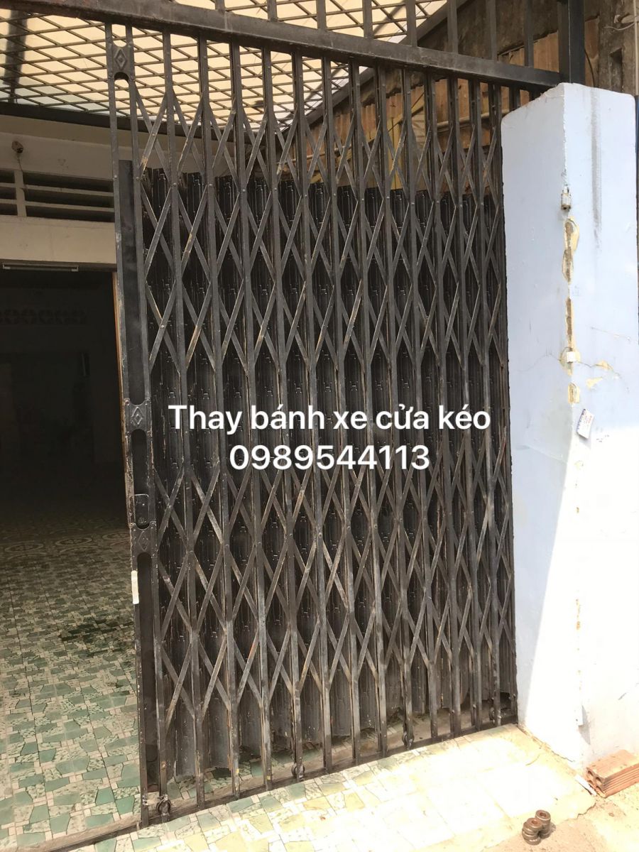 sửa cửa sắt