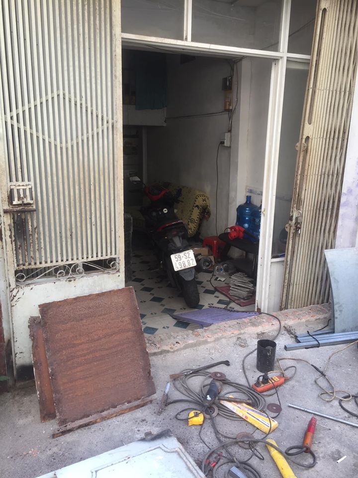 sửa cửa sắt