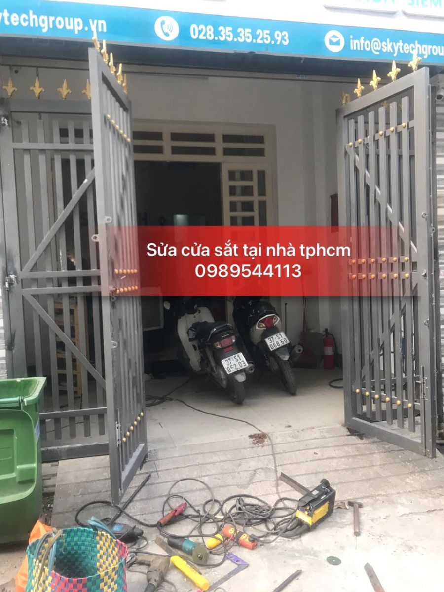 sửa cửa sắt