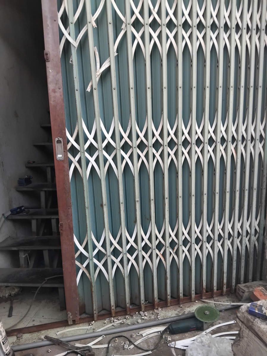 sửa cửa sắt tại nhà