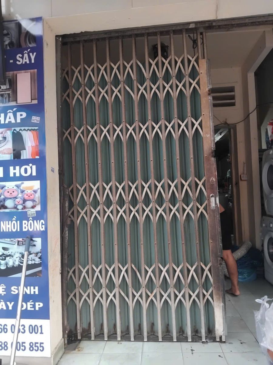 sửa cửa sắt kéo