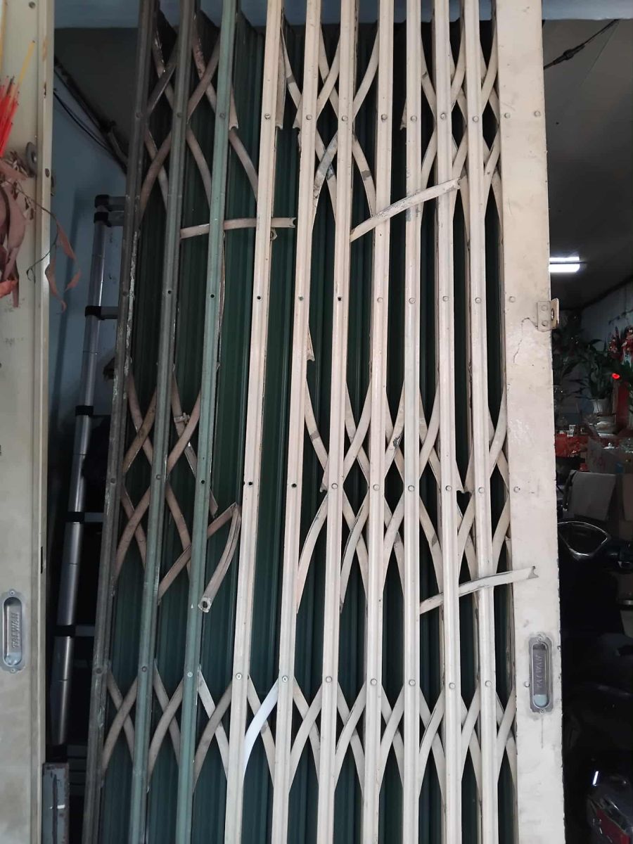 sửa cửa sắt
