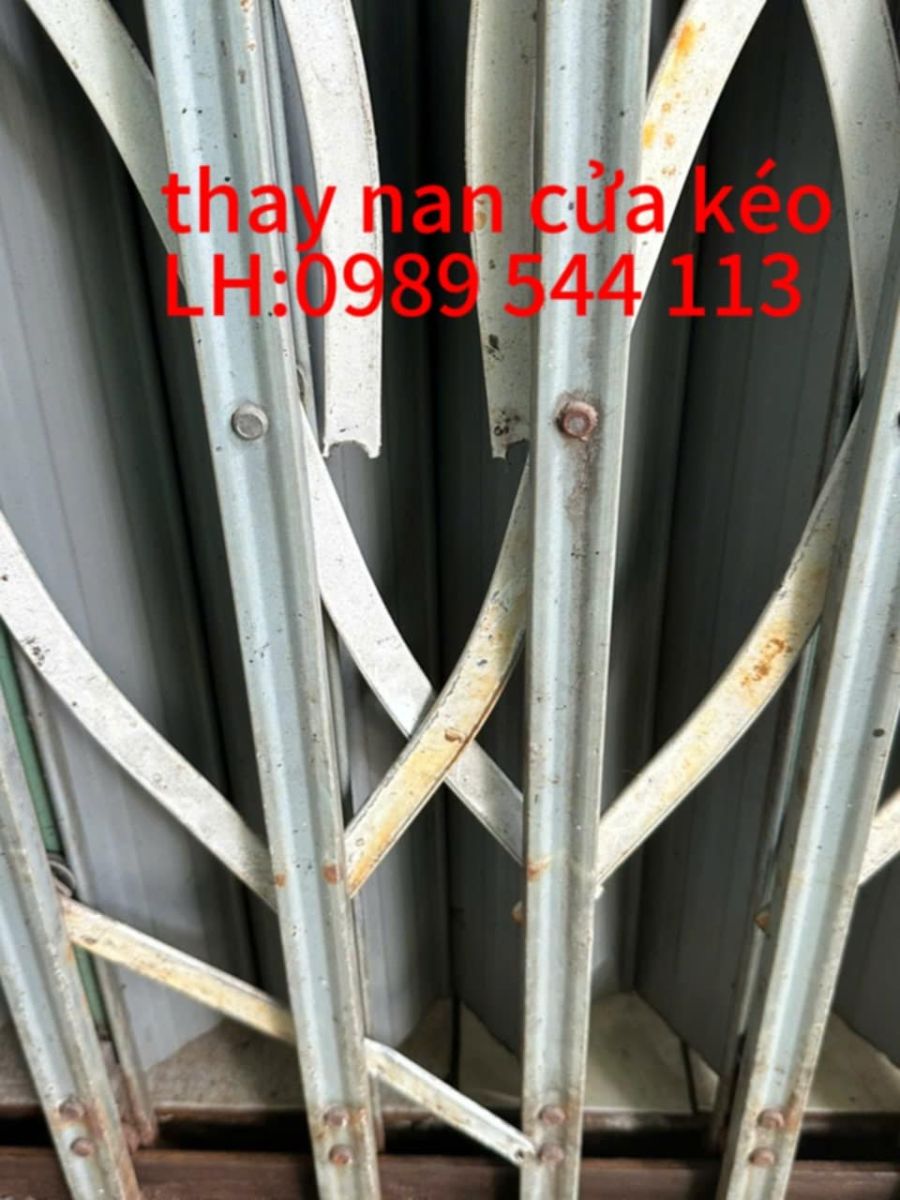 sửa cửa sắt