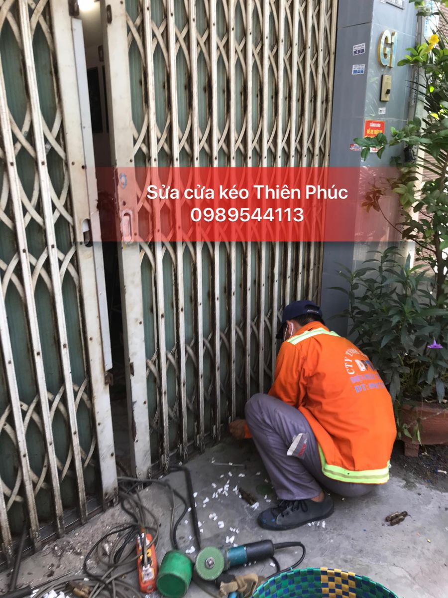 sửa cửa sắt