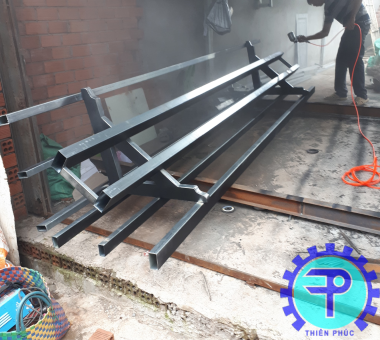 sửa cửa sắt