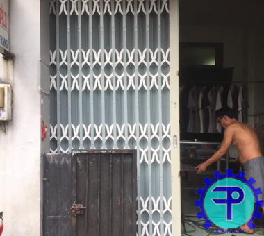 sửa cửa sắt
