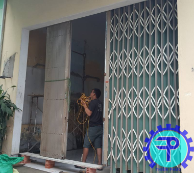 sửa cửa sắt tại nha