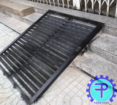 sửa cửa sắt bình thạnh