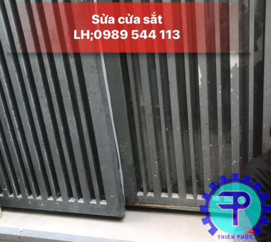 sửa cửa sắt quận 2