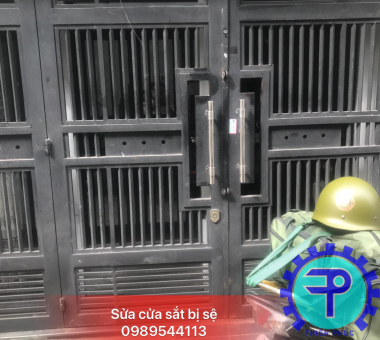 sửa cửa sắt quận 7
