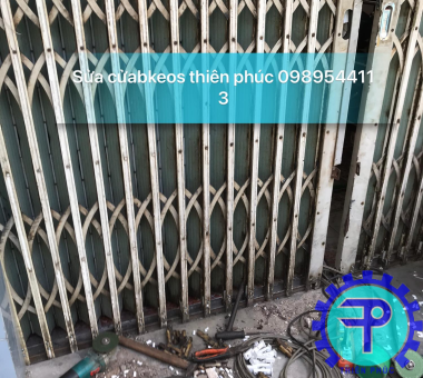 sửa cửa sắt quận 9