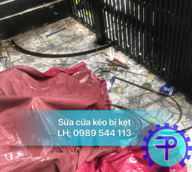 sửa cửa sắt