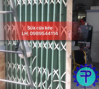 sửa cửa sắt