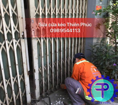 sửa cửa sắt quận 11